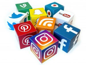 Cubes, with various social media icons on them - Facebook, pinterest, twitter, snapchat, rss etc