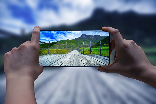 Smartphone with a landscape photograph being taken