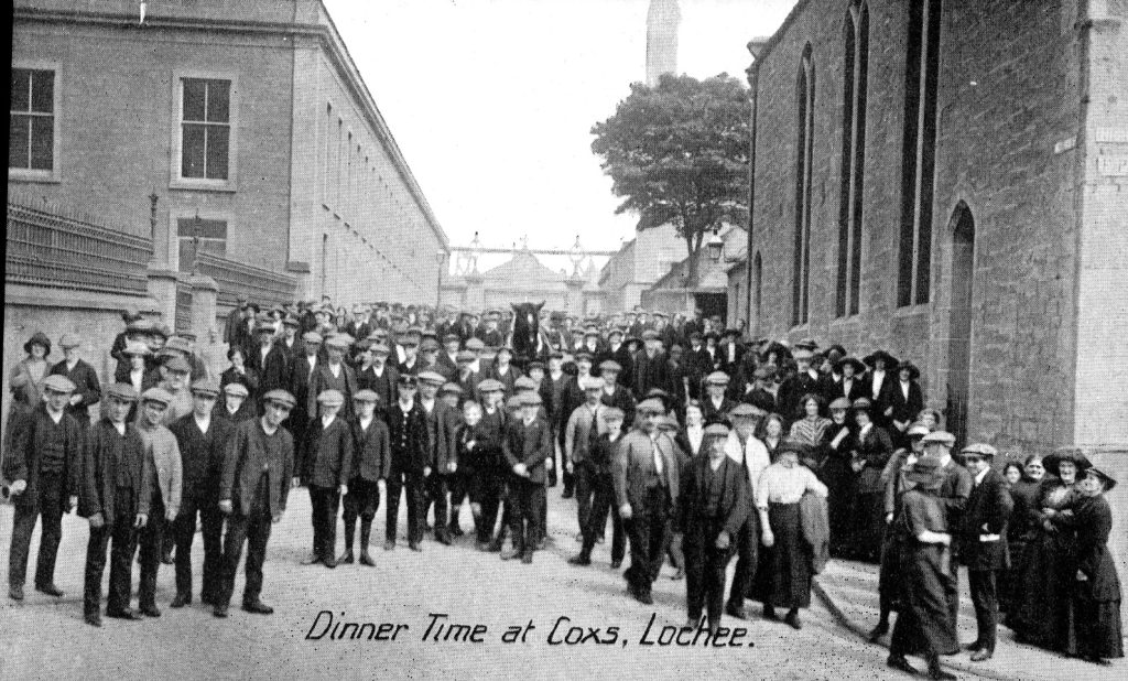 Picture of workers outside a factory